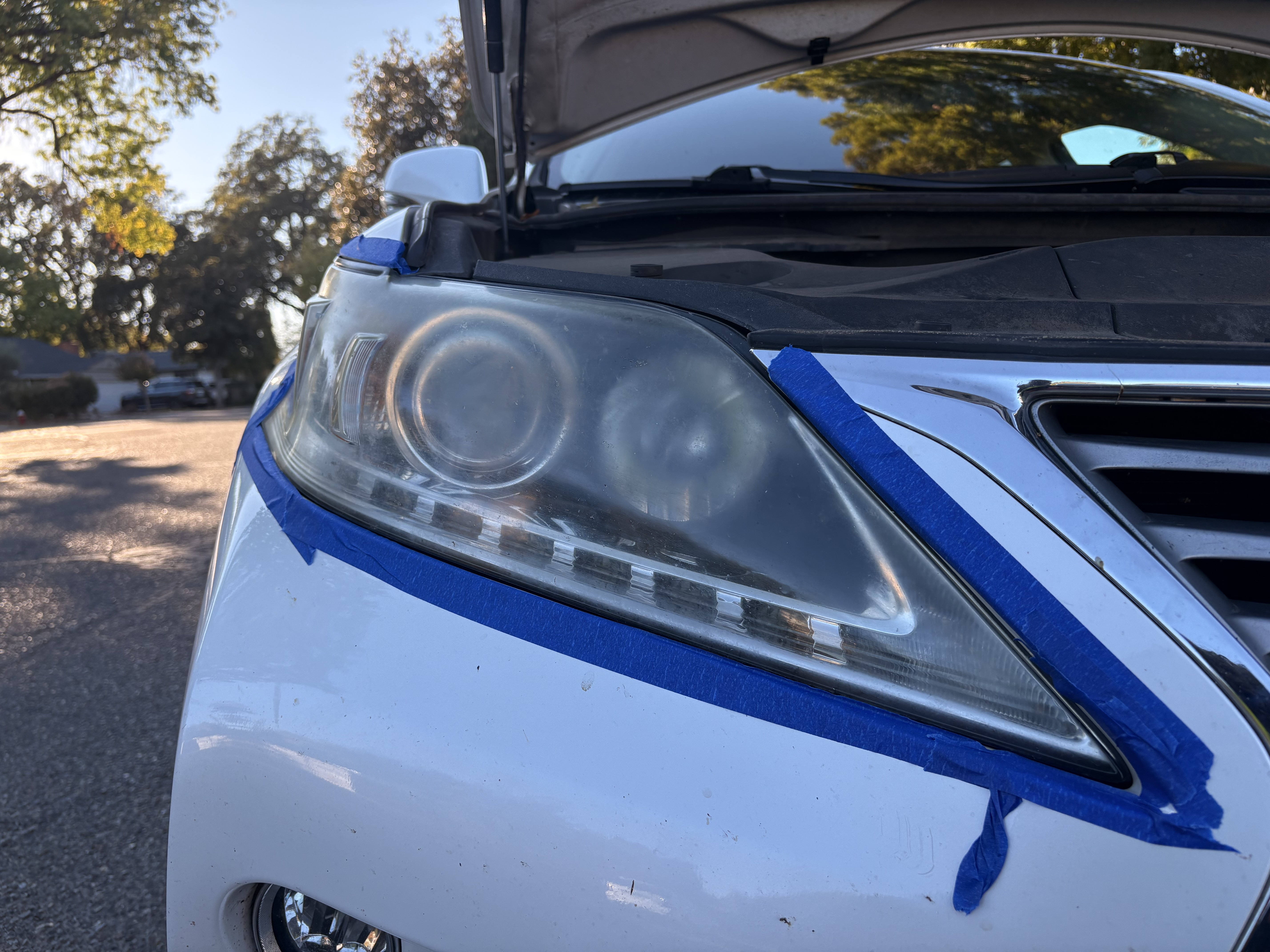 Lexus headlight before restoration, cloudy and yellowed